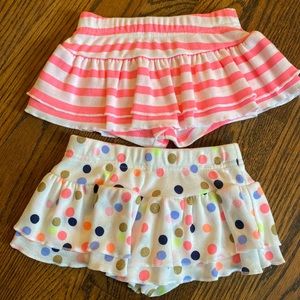 Set of 2 skorts, 6-9 months. Never worn. Gerber graduates